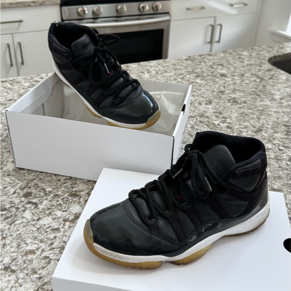 Jordan 11 Black Sneakers with Red Patent and Mid-Top